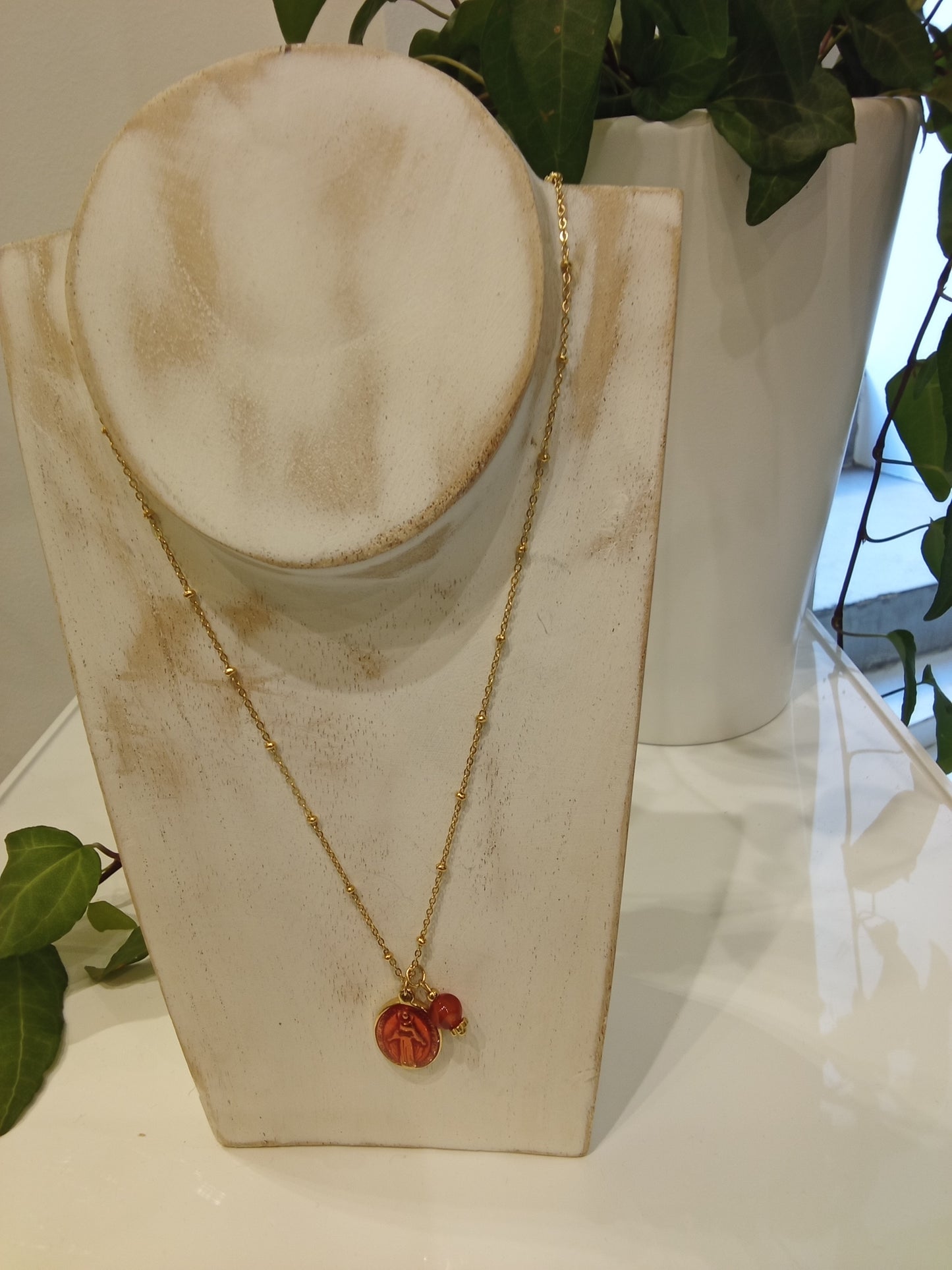 Red virgin Mary medallion