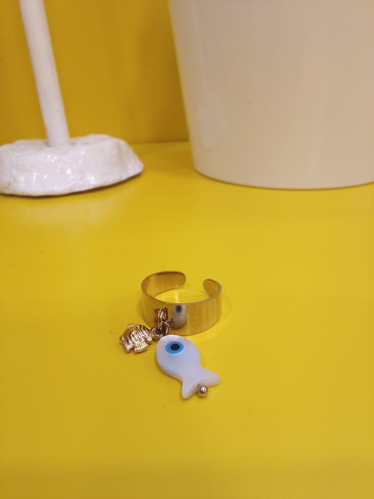 Ring attached to a fish charm