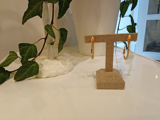 Snake curved earrings each 60€