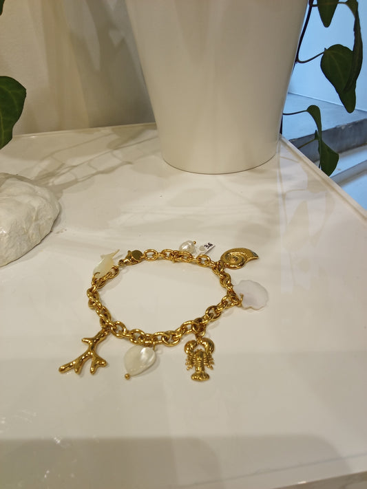 Bracelet with lobster, bone,pearl white fish & heart charm