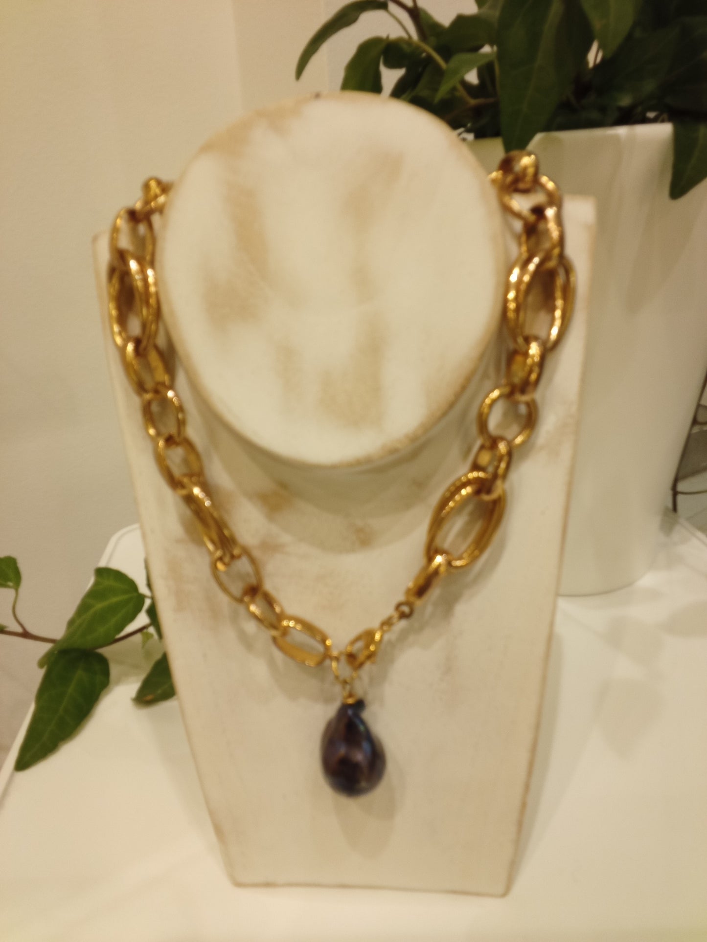 Chunky chain necklace with dark purple gemstone