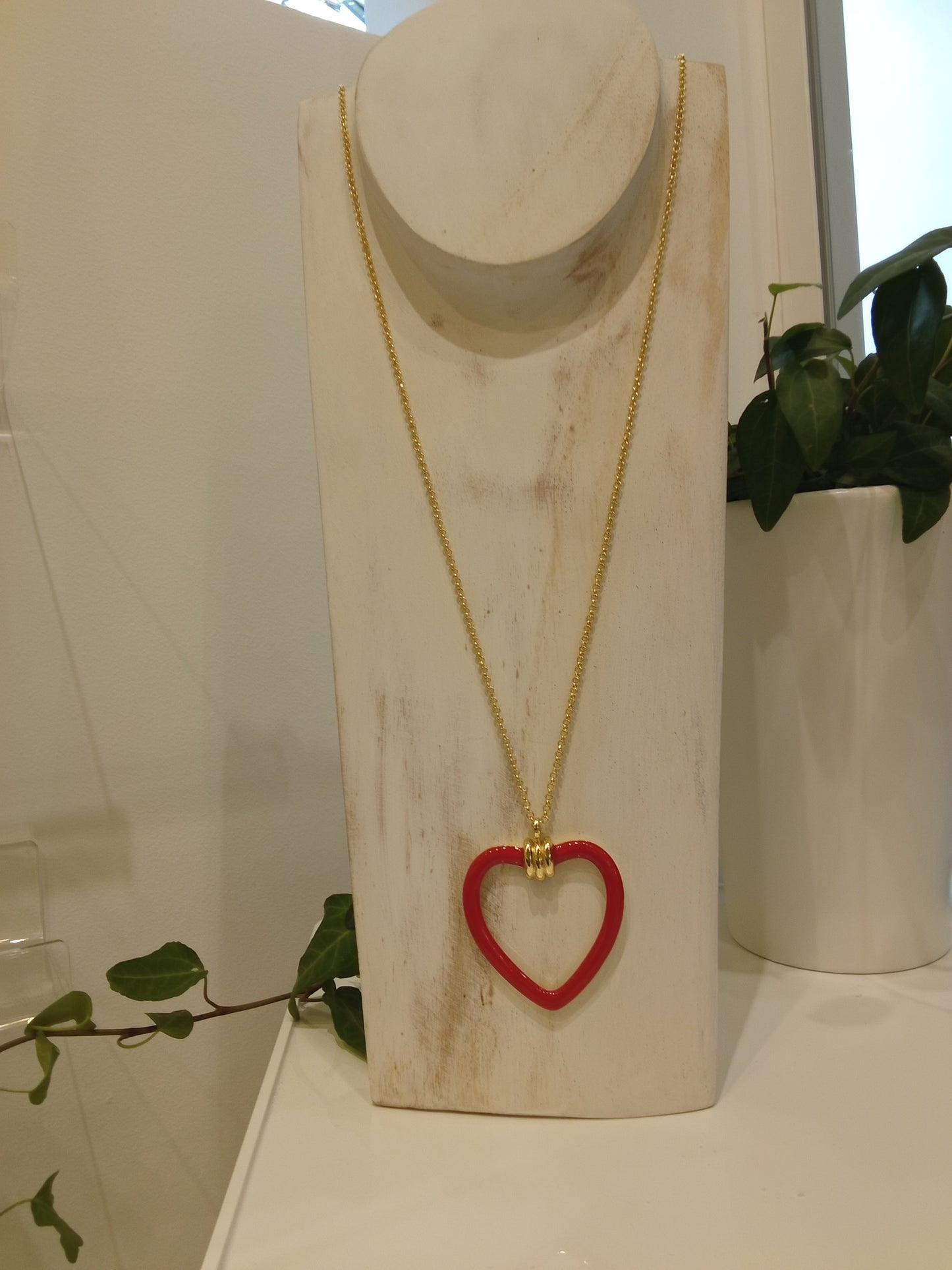 Open heart charm necklace