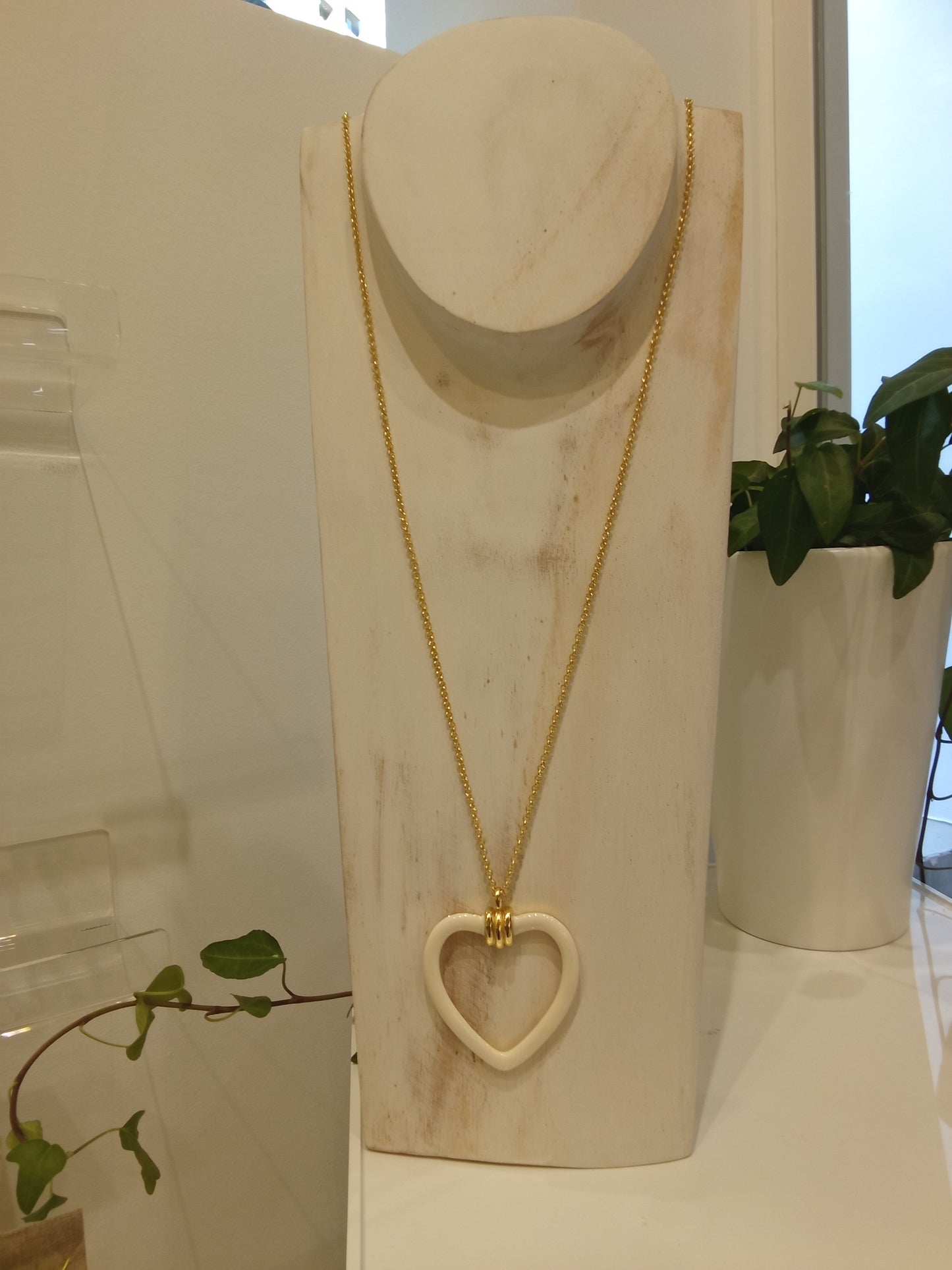 Open heart charm necklace
