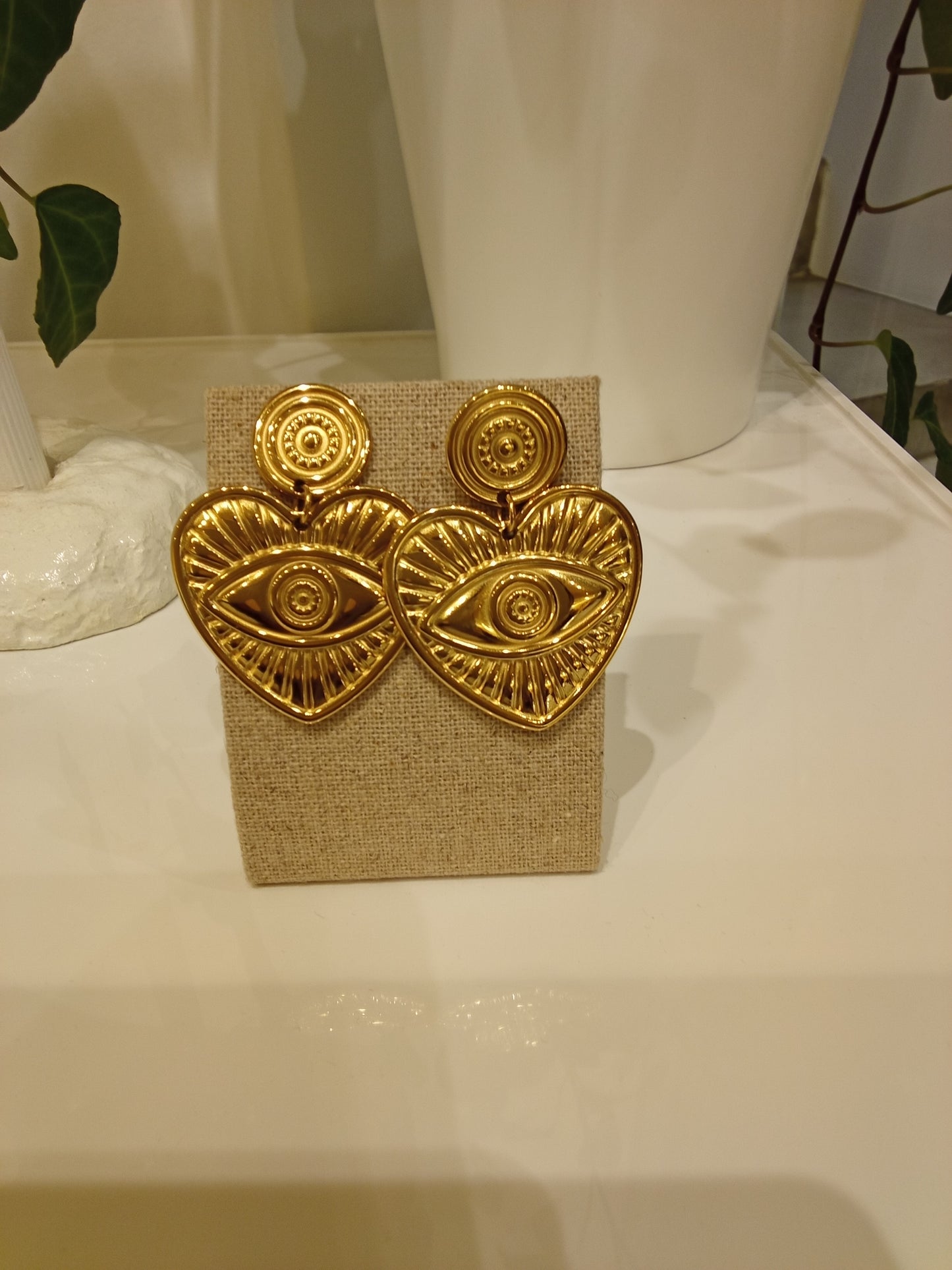 Heart evil eye earrings