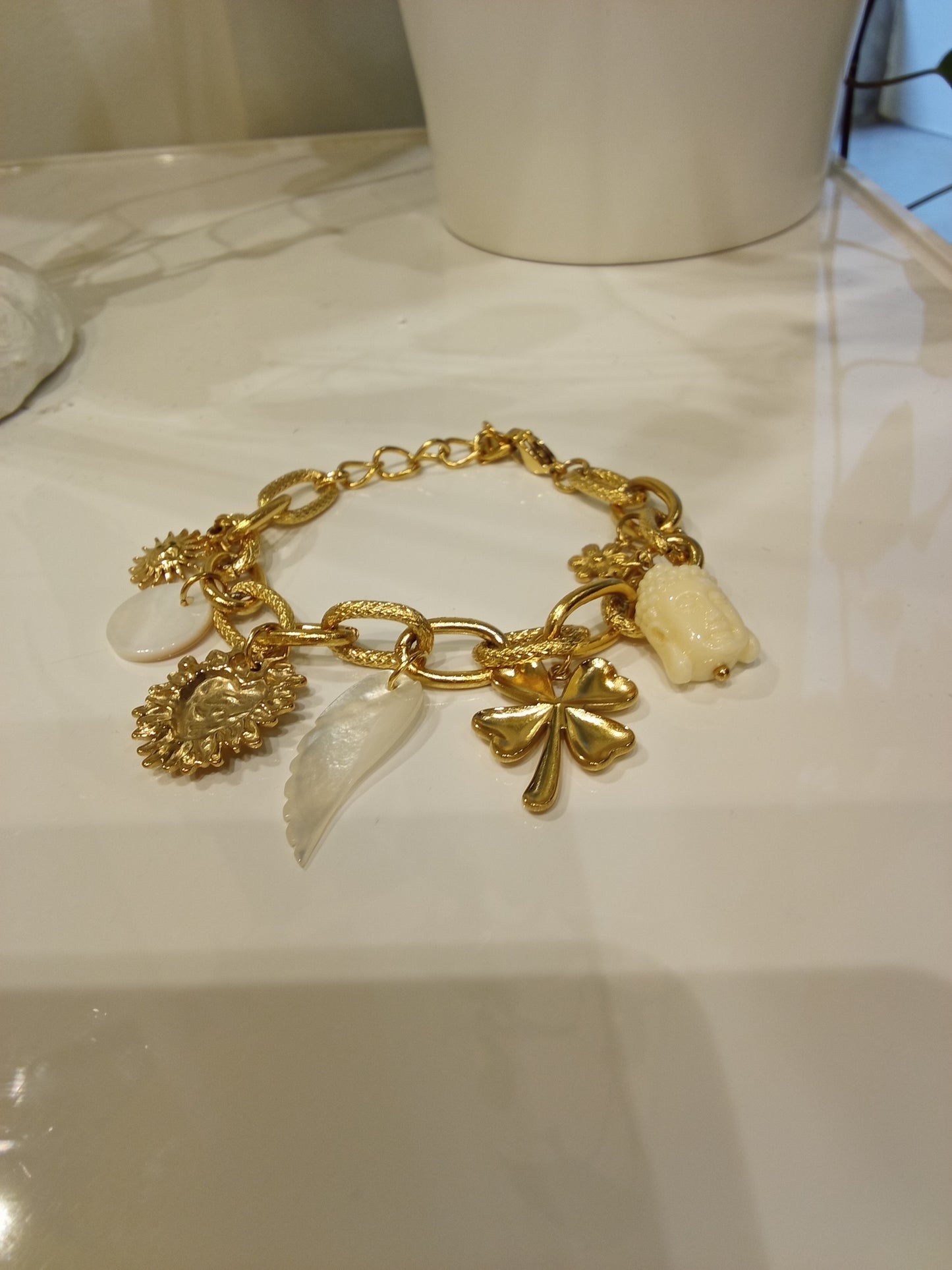 Bracelet with lucky charm,Buddha,sun,heart sun,wing