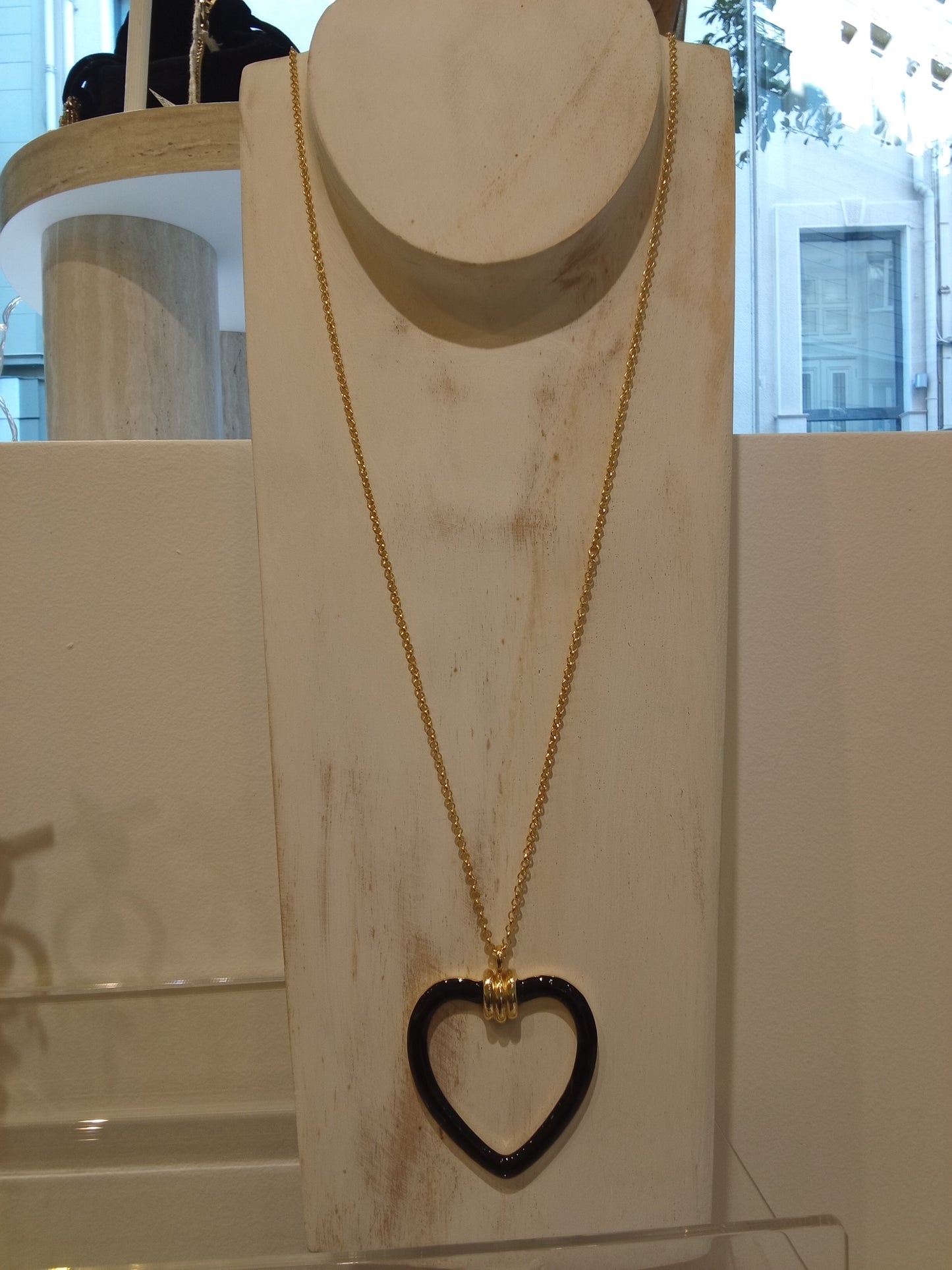 Open heart charm necklace