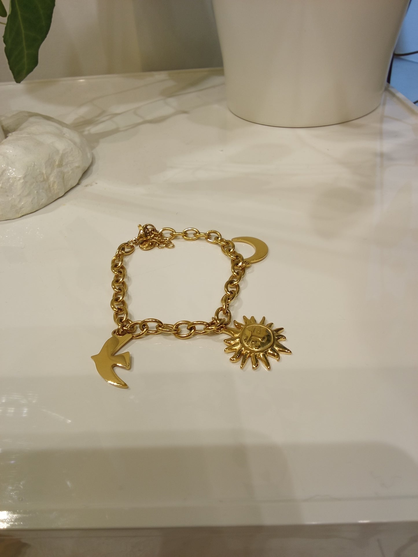 Bracelet with moon,sun & bird charm