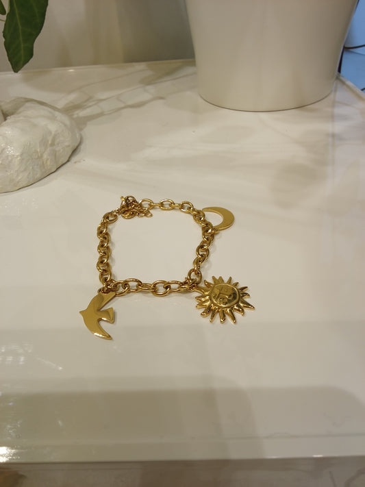 Bracelet with moon,sun & bird charm
